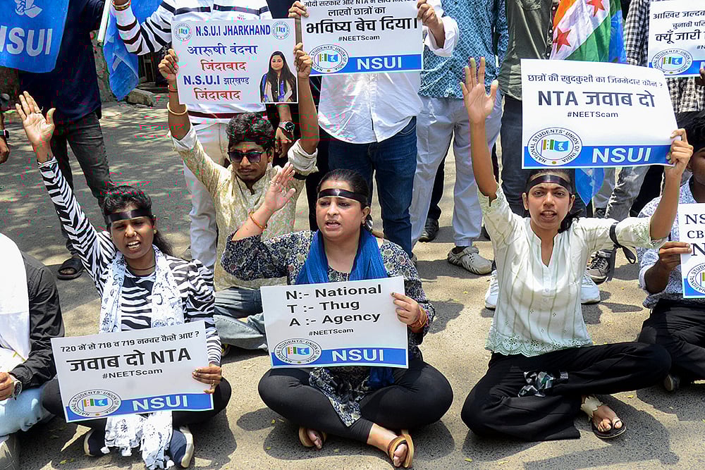 Photo: PTI : Protest over NEET 2024 results